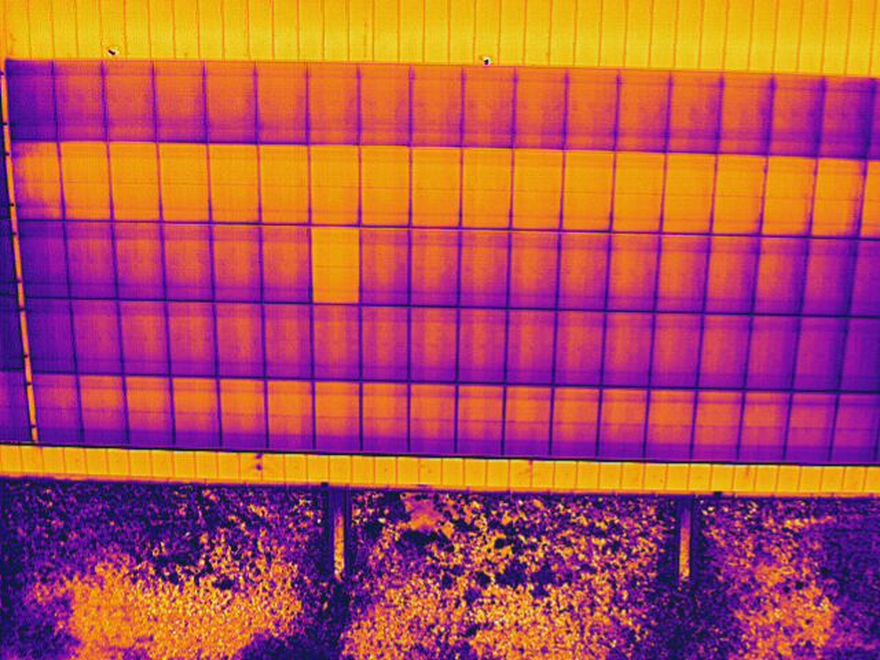 Aerial thermal survey of a roof-mounted solar array